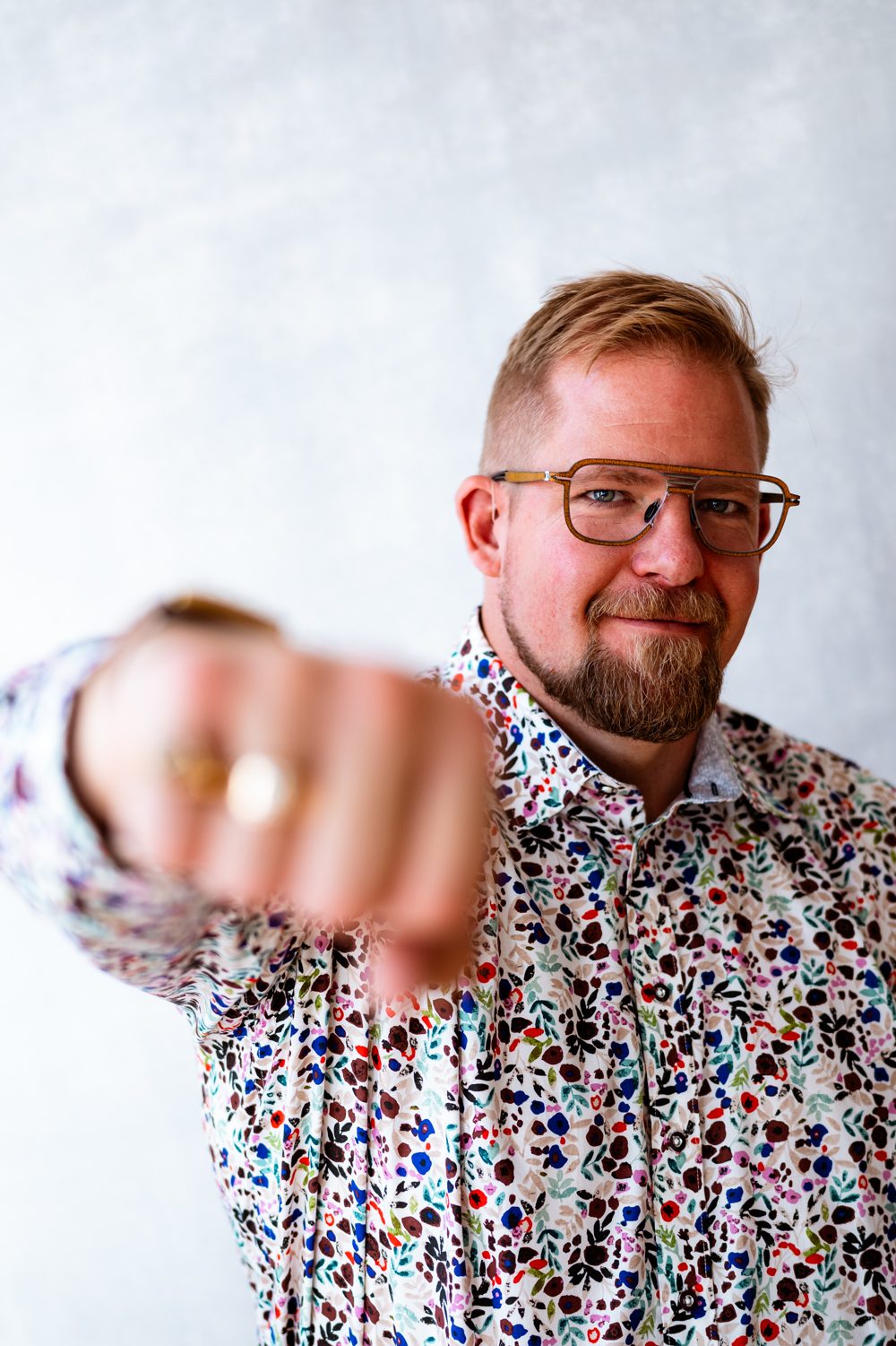 Jon reaching a fist toward the camera